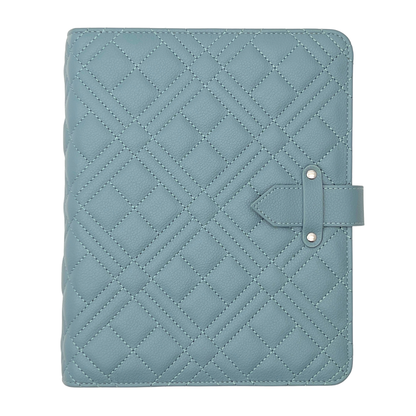 Quilted blue tablet case with a strap on a white background