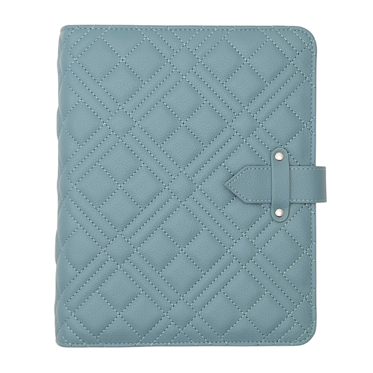 Quilted blue tablet case with a strap on a white background