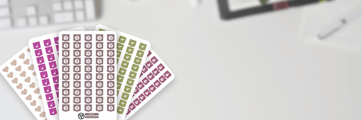 Heart, cleaning, meal, travel and money stickers on desk